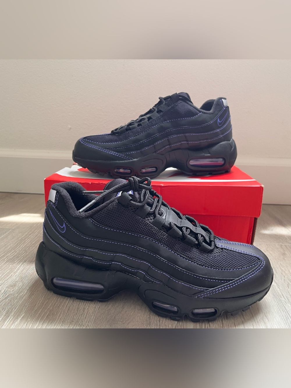 Nike Kids Black Sneakers with Purple Stitching